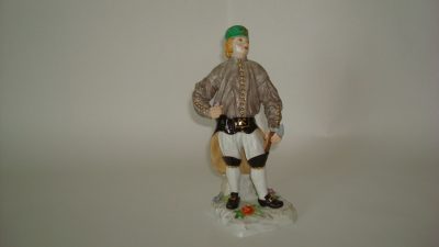 A fine figure of a Meissen Porcelain Miner as Foreman of Miners