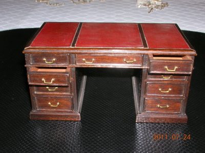 Miniature Mahogany Knee Hole Nine Drawer Desk with Leather Top